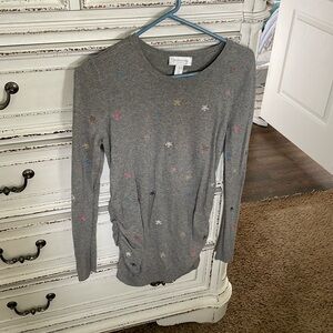 Motherhood maternity long sleeve sweater with flowers embroidered on it.